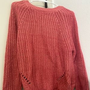 Pink knitted sweater